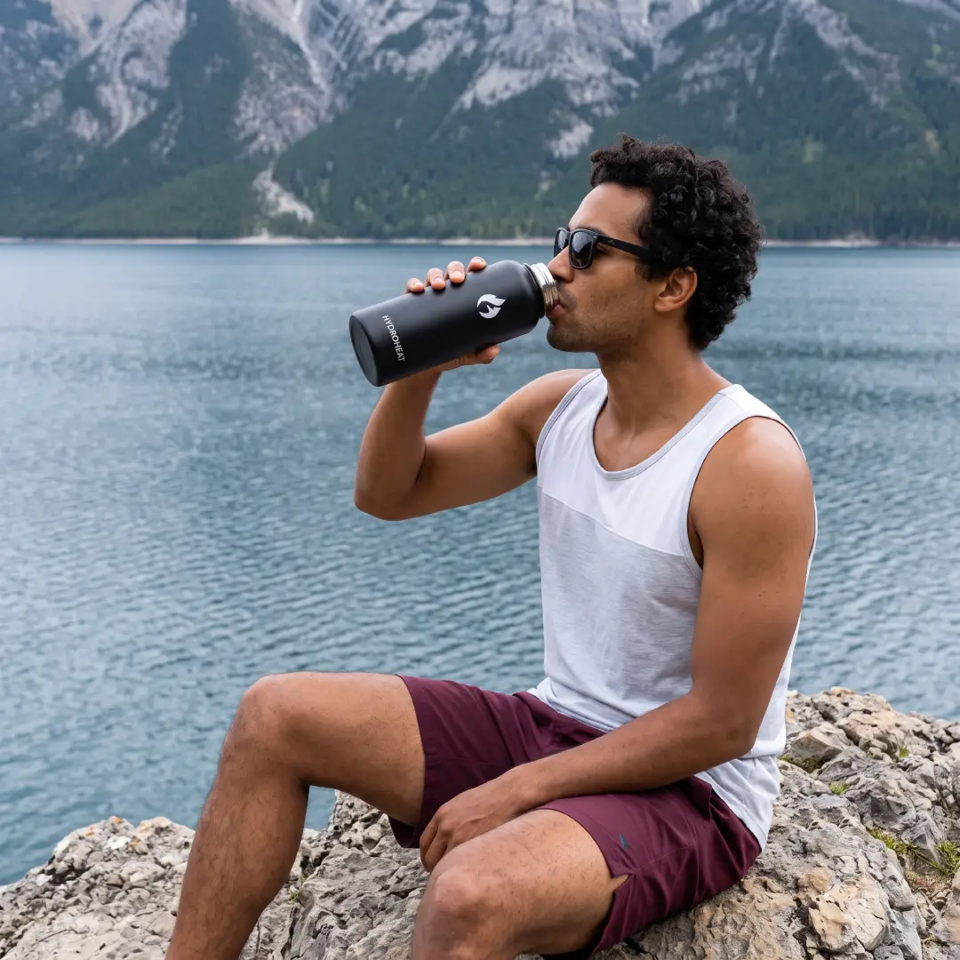 BJPKPK 64 oz Insulated Water Bottle with Straw Lid and Paracord Handle image 2